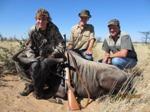 Darren, Mikea, and Aabram after the Wildebeeste hunt