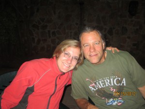 John and Mia around the fire