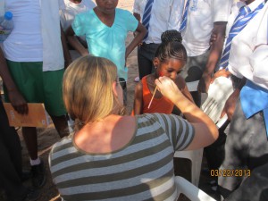 Danielle brought face paints and painted every single child's face.